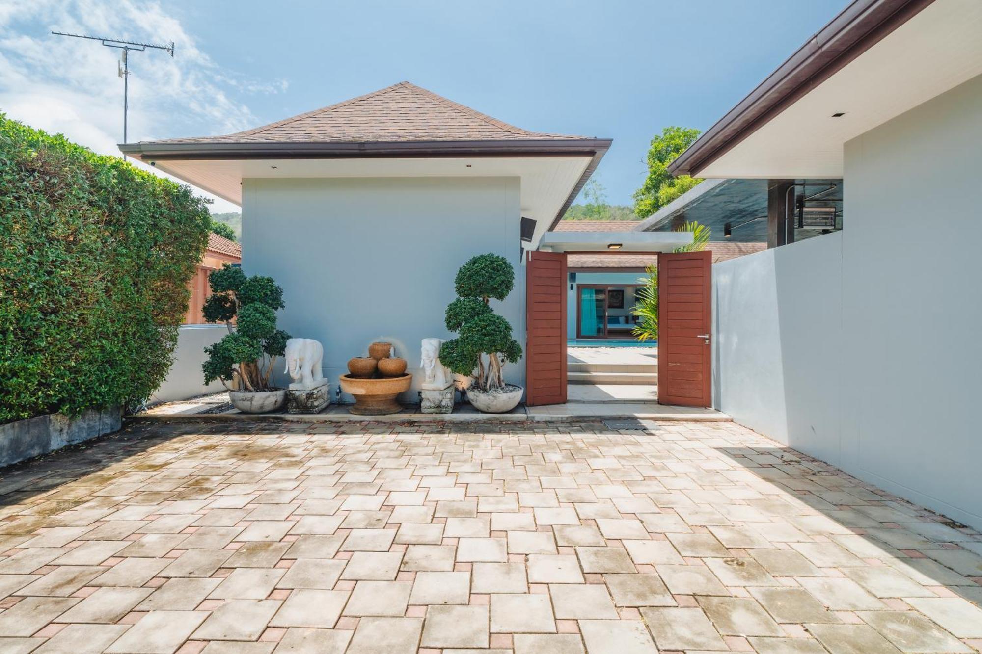 Bangtao Boutique Villa Praia de Bang Tao Exterior foto
